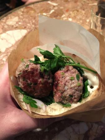 Miznon signature dishes Beef Bourguignon PitaLamb Kebab PitaRatatouille PitaWhole Roasted Cauliflower